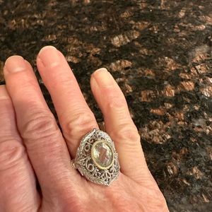 Sterling silver ring with agreement amethyst stone.